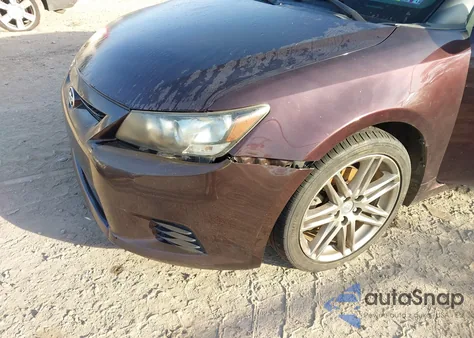 2011 Scion Tc z USA, uszkodzony, nr VIN JTKJF5C73B3014204